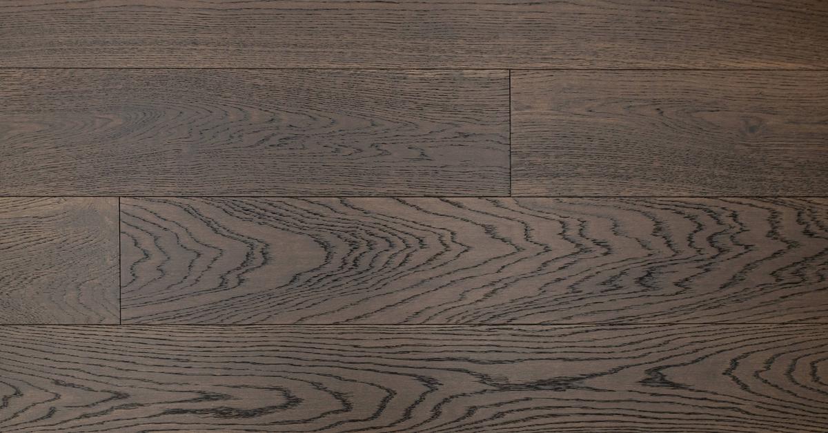 Close-up of dark wood flooring with visible grain and texture