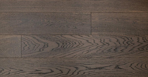 Close-up of dark wood flooring with visible grain and texture